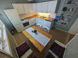 Kjøkken eller kjøkkenkrok på Romslig leilighet