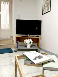 TV a/nebo společenská místnost v ubytování La Dimora Segreta