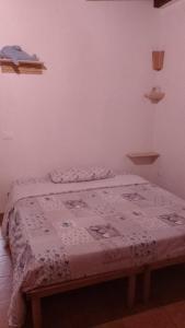 Кровать или кровати в номере Casa vacanze Daunisi
