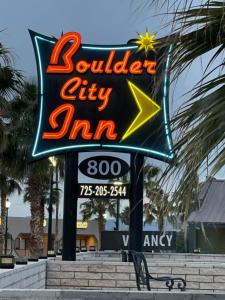 um sinal para uma cidade cullen miim em Boulder City Inn em Boulder City