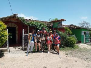 a group of people standing in front of a building at Casa Ricardo Sonis in Somoto