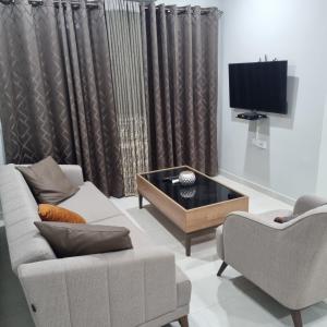Et sittehjørne på Luxury 2 bedroom, 2 bathroom seaside Apartment in Aquaview Complex