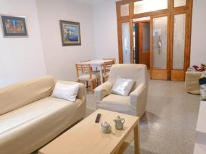 Posezení v ubytování Apartamento Universidad + 2 fotografie