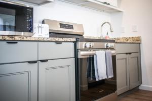 a kitchen with a stove and a microwave at Condo in Crescent Bar in Quincy