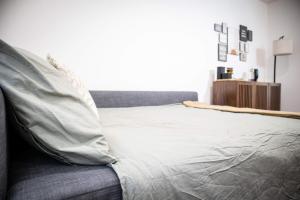 a bed with a pillow on top of it at Condo in Crescent Bar in Quincy