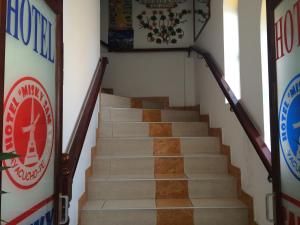 a flight of stairs in a building at Hotel Misky Samay in Ayacucho