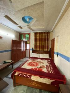 Krevet ili kreveti u jedinici u okviru objekta Zain Hotel Abbottabad