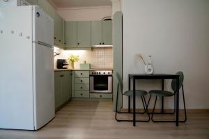 Kuchyň nebo kuchyňský kout v ubytování Sirmar Seaview Apartment