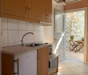 Kuchyň nebo kuchyňský kout v ubytování Albatros rooms