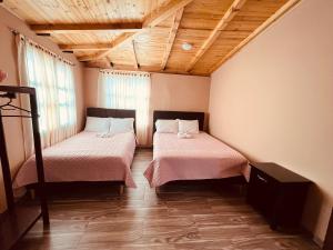 Postel nebo postele na pokoji v ubytování La Posada de Elisea - Mongui