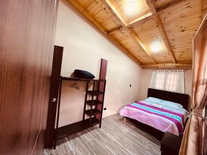 Postel nebo postele na pokoji v ubytování La Posada de Elisea - Mongui