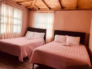 Postel nebo postele na pokoji v ubytování La Posada de Elisea - Mongui