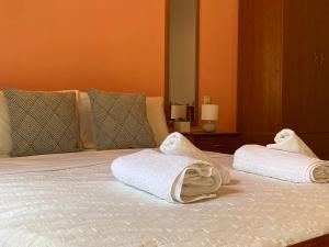Postel nebo postele na pokoji v ubytování Albatros rooms