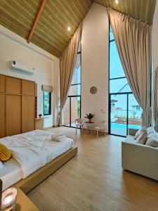 Voodi või voodid majutusasutuse ASTRID PoolVilla KhaoYai toas +37 fotot