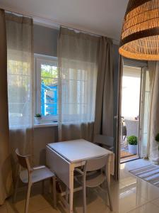 Postel nebo postele na pokoji v ubytování Domki i Apartamenty El-Piero