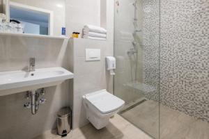 Koupelna v ubytování Hotel Novum