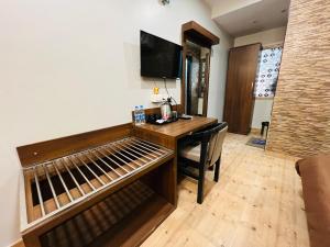 TV a/nebo společenská místnost v ubytování Hotel Sabera