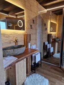 a bathroom with a sink and a mirror at Landgasthof Zur Linde in Kronach