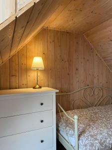 Postel nebo postele na pokoji v ubytování Domki i Apartamenty El-Piero