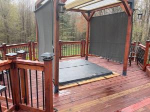 a gazebo with a screen on a deck at Where Memories Are Made in West Kill +62 photos