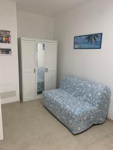 Postel nebo postele na pokoji v ubytování Vitti Apartment