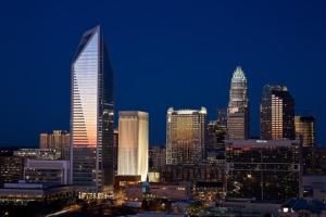 a view of a city skyline at night at Charlotte tiny Home getaway 5 min to lake Wylie in Charlotte