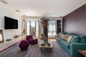 A television and/or entertainment centre at Waou Chamberi II - Alquiler Corta Duración