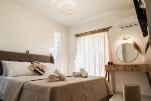 Postel nebo postele na pokoji v ubytování Elite Luxury Residences