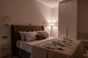 Postel nebo postele na pokoji v ubytování Elite Luxury Residences