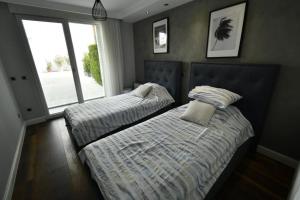 Postel nebo postele na pokoji v ubytování Manavgat - Superb 2 bedroom apartment near beach and Side centre + 23 fotografií