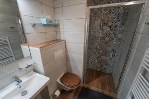 Koupelna v ubytování Hotel Gabreta