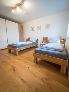 Postel nebo postele na pokoji v ubytování Ferienwohnung Winkler Abenberg