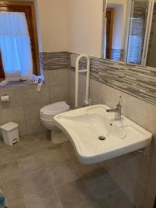 Koupelna v ubytování Agriturismo La casina di Castellinuzza e Piuca + 4 fotografie