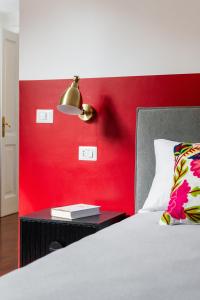 Letto o letti in una camera di Mecenate Suite Colosseum