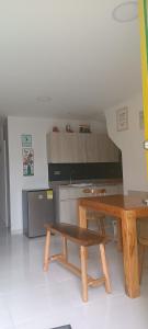 Kuchyň nebo kuchyňský kout v ubytování APARTAMENTO TURISTICO Y VACACIONAL SALENTO QUINDIO A-1 + 10 fotografií