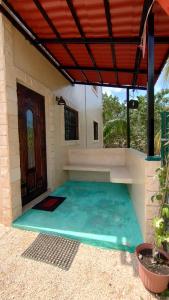 Bazén v ubytovaní Casa Vacacional Chukum Rio Lagartos alebo v jeho blízkosti