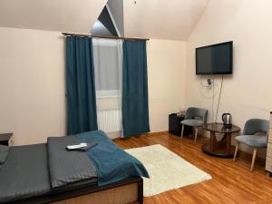 Postel nebo postele na pokoji v ubytování Отель Ренессанс