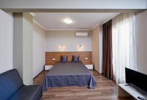 Postel nebo postele na pokoji v ubytování Bendita House