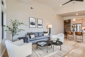 a living room with a couch and chairs at Helling Circle Hideaway 303 in Heber City