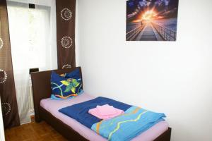 
Ein Bett oder Betten in einem Zimmer der Unterkunft Ferienwohnung in Augsburg Hochzoll N
