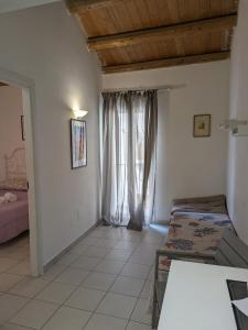Posteľ alebo postele v izbe v ubytovaní atocà3 casa vacanze - vedi anche atocà1 e atocà2
