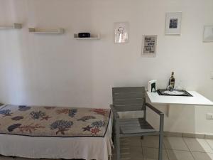 Posteľ alebo postele v izbe v ubytovaní atocà3 casa vacanze - vedi anche atocà1 e atocà2