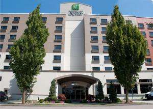 a rendering of the front of the hotel at Holiday Inn Express Vancouver Airport-Richmond, an IHG Hotel in Richmond