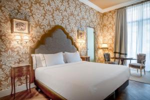 Postel nebo postele na pokoji v ubytování Hotel Palacio del Retiro, Autograph Collection