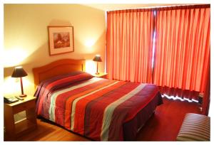 Cama o camas de una habitación en Andes Suite Home Ebro
