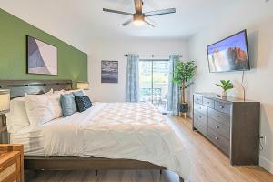 a bedroom with a bed and a ceiling fan at Exclusive Unit Golf Side- Walkable Area - King Bed - N248 in Scottsdale