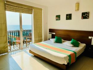 Postel nebo postele na pokoji v ubytování Saprin Beach Resort