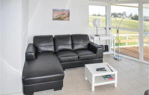 Posezení v ubytování Holiday Home Havmose Augustenborg X + 11 fotografií