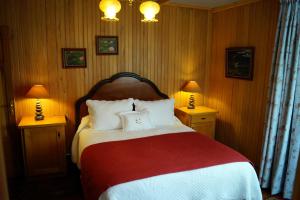 Postel nebo postele na pokoji v ubytování Tradicion Austral Bed & Breakfast