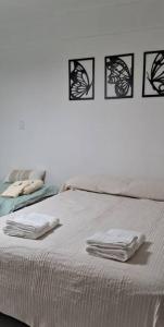 Postel nebo postele na pokoji v ubytování Alojamiento Newenquen